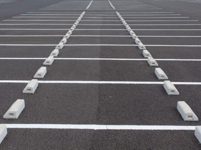 Parking lot sealcoating