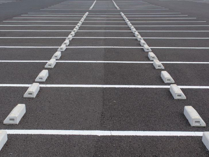 Parking lot sealcoating